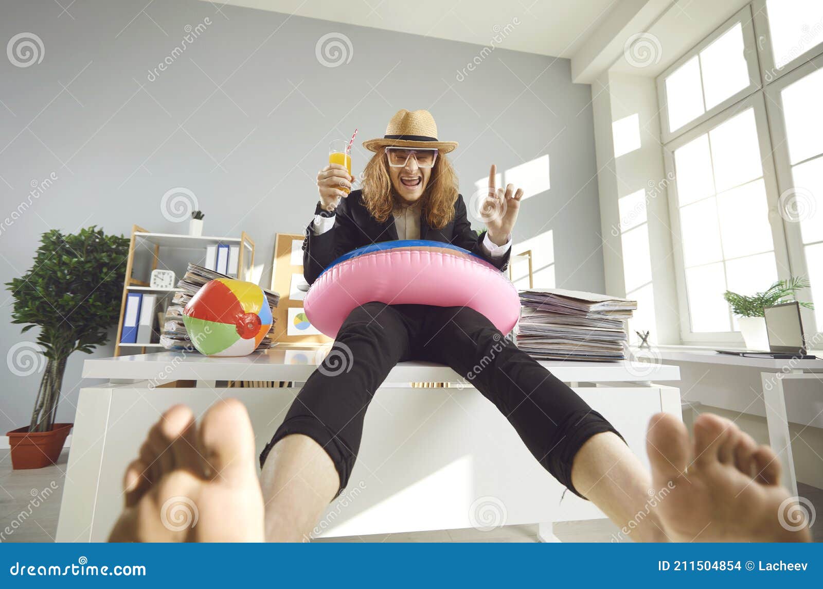 Funny Barefoot Office Worker Sitting on Desk, Drinking Juice and Waiting  for Holidays Stock Photo - Image of cocktail, desk: 211504854