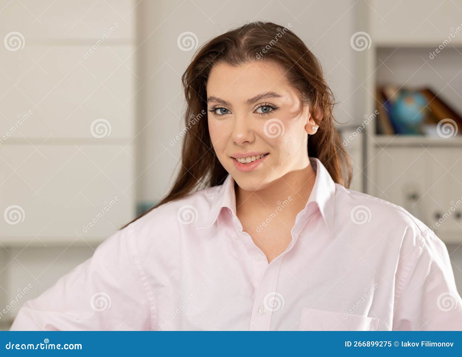Office Worker Woman is Working at a Computer in Office Stock Image