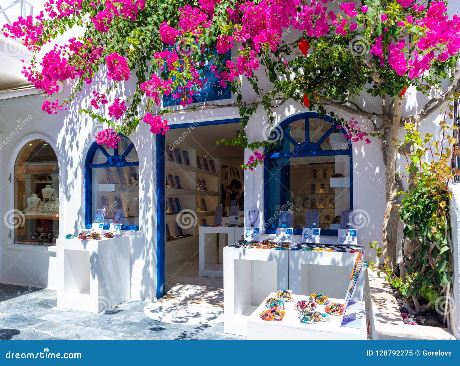 Beautiful Exterior of Souvenir Shop, Decorated with Purple Bougainvillea  Flowers at Santorini Island. Editorial Image - Image of decor, craft:  128792275