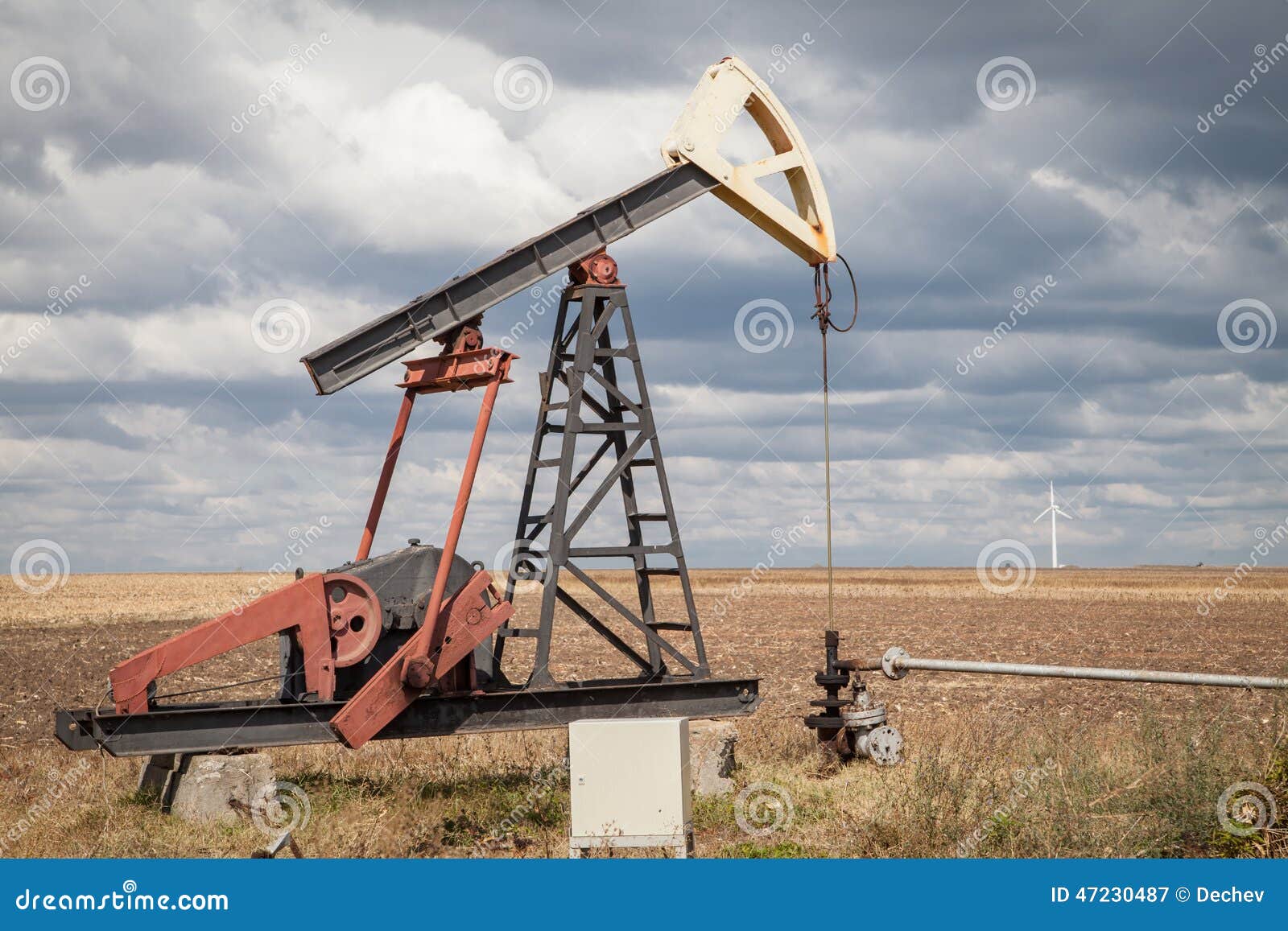Oil pump, cloudy sky stock image. Image of construction 47230487
