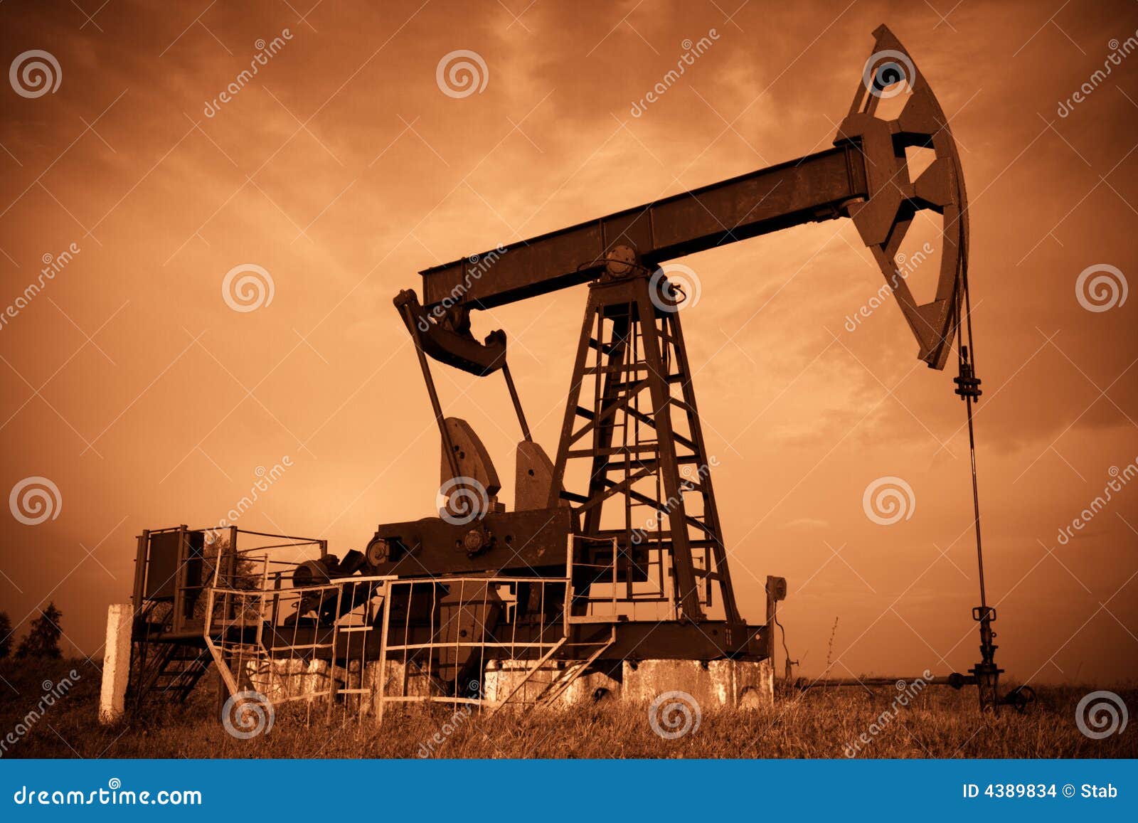 Oil pump jack stock image created by Stab