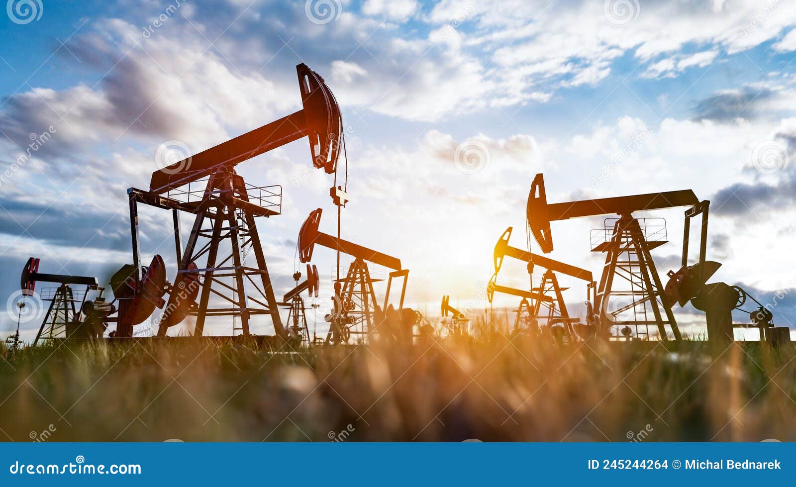 Oil Pump Jack Work on Oilfield Petroleum Extraction Stock Photo Image