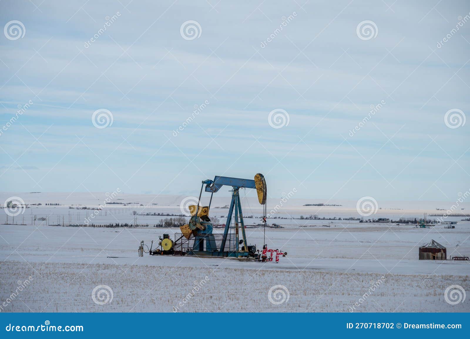 Oil Pump in Winter in the Oil Fields of Alberta Stock Photo Image of