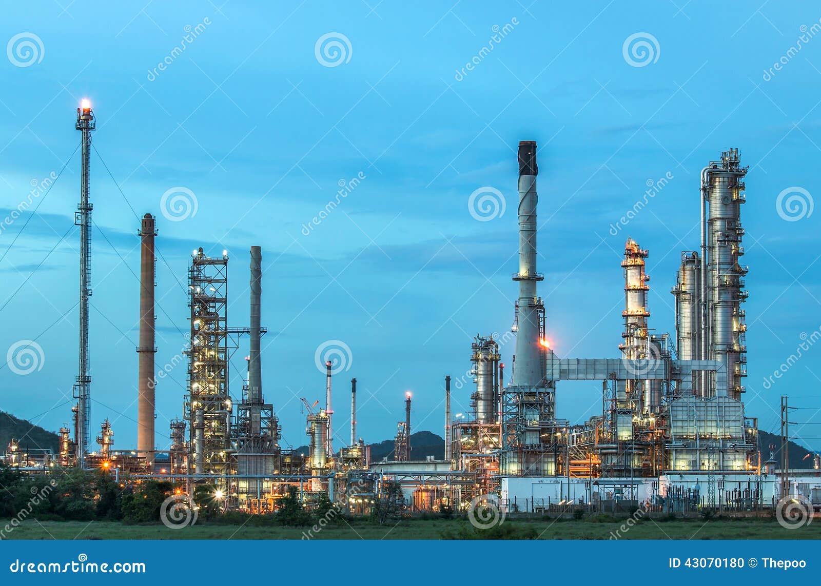 Oil refinery at twilight, locations in Thailand.