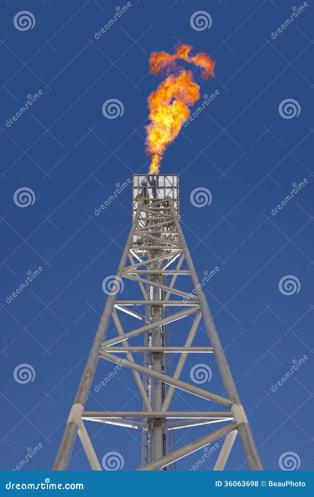 Oil Rig Gas Flare Tower stock photo. Image of industry 36063698