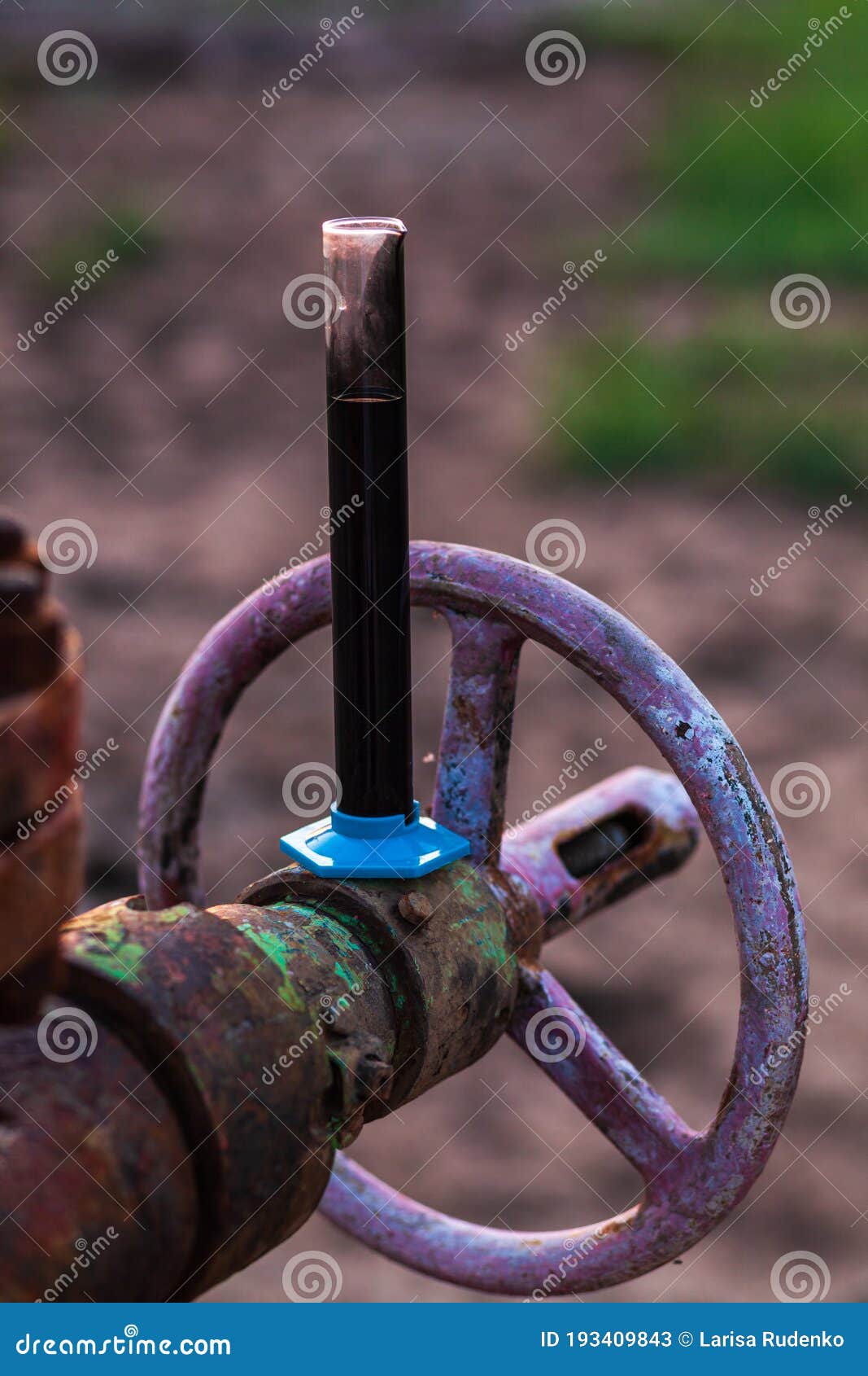 Oil Sample in a Test Tube on an Oil Pump Stock Image Image of