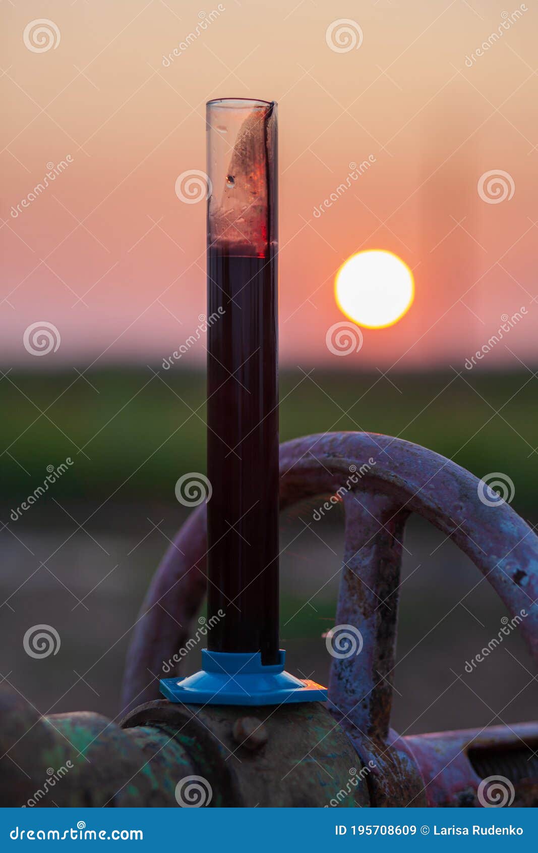 Oil Sample in a Test Tube on an Oil Pump Stock Image Image of