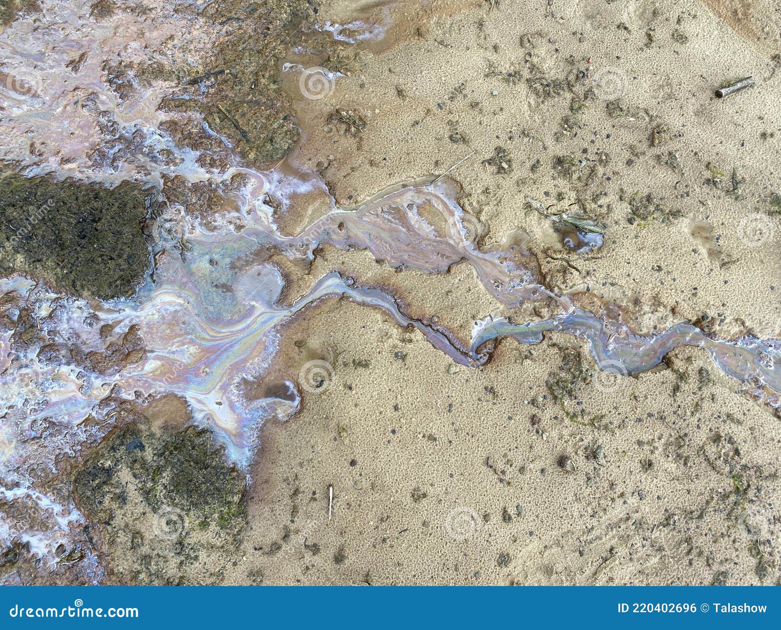 Oil spills on the sand stock photo. Image of shoreline 220402696