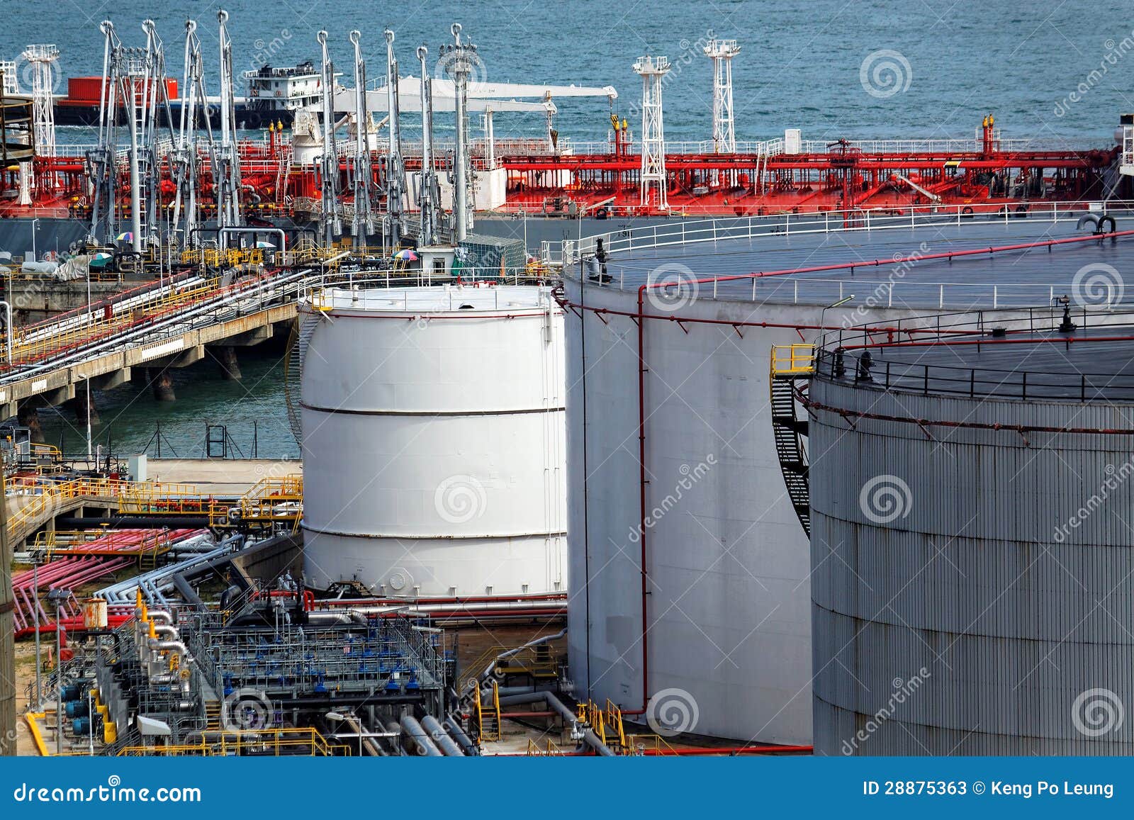 Oil tanks and ship at day stock image. Image of close 28875363
