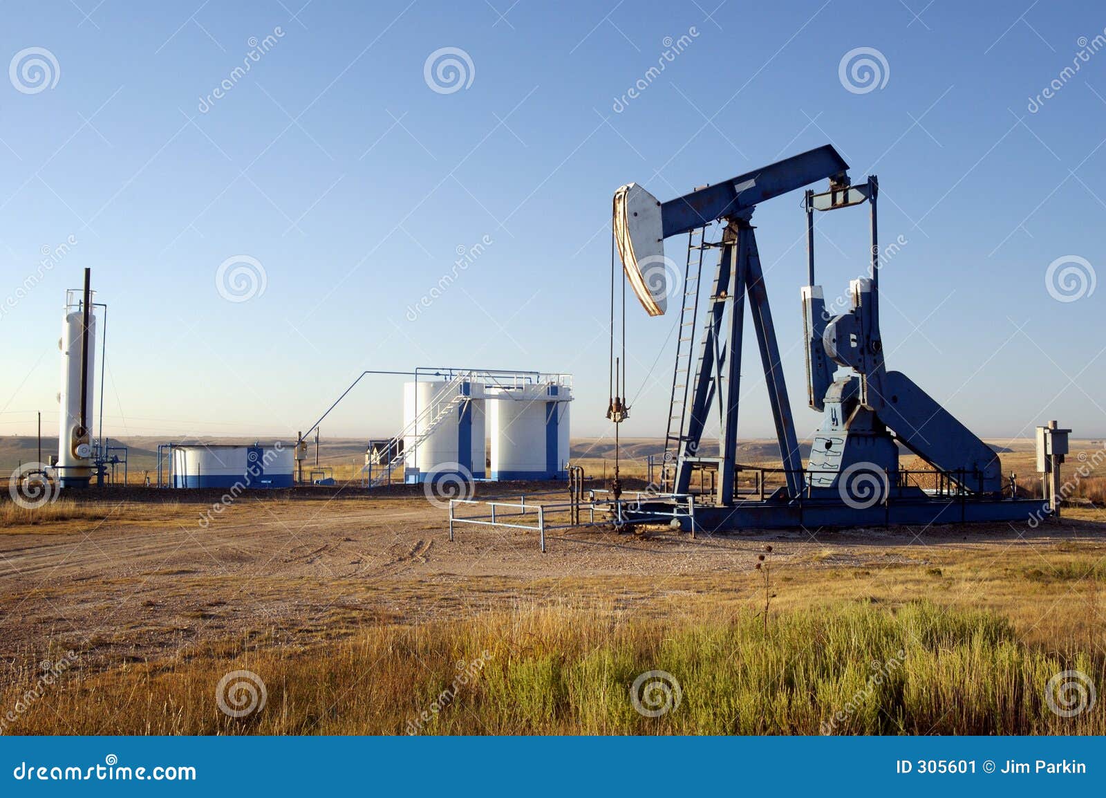 oil well and storage tanks