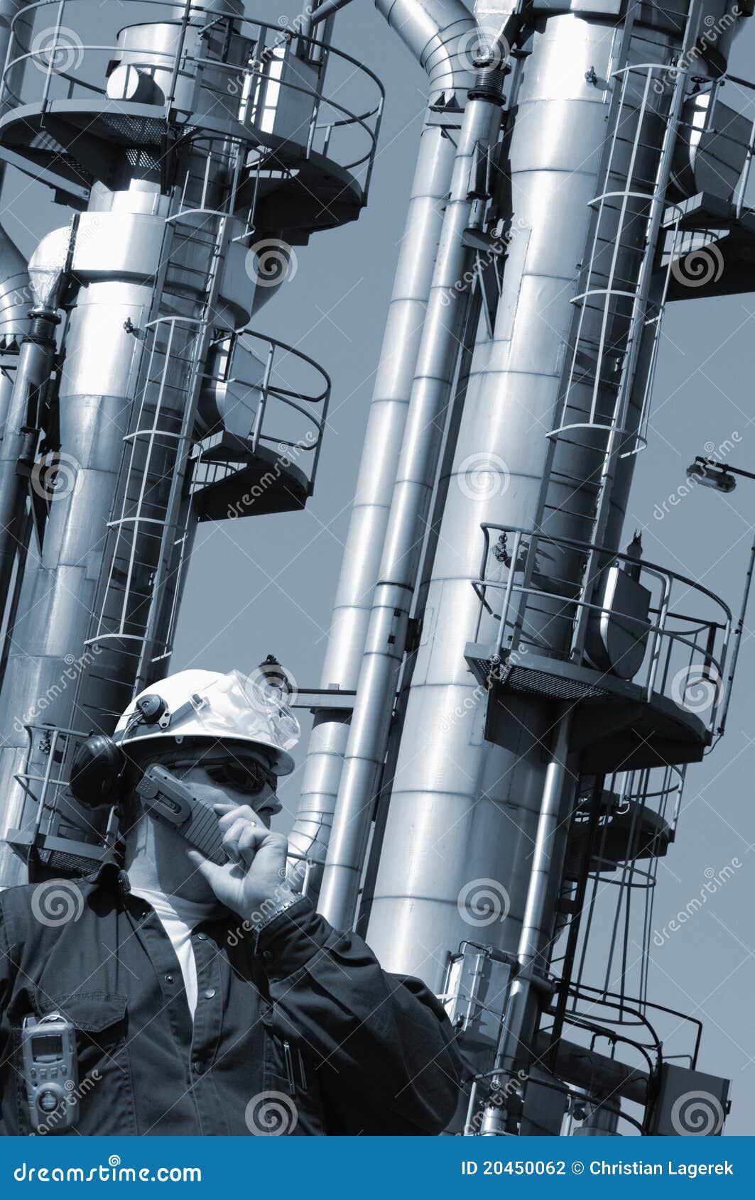 Oil worker and oil towers stock photo. Image of industry 20450062