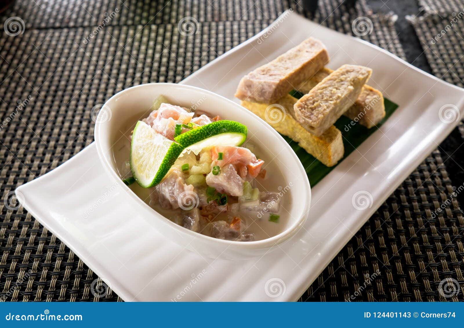oka - known as kokoda, poke, ceviche, or poisson cru - is polynesian raw fish salad from samoa, with taro chips