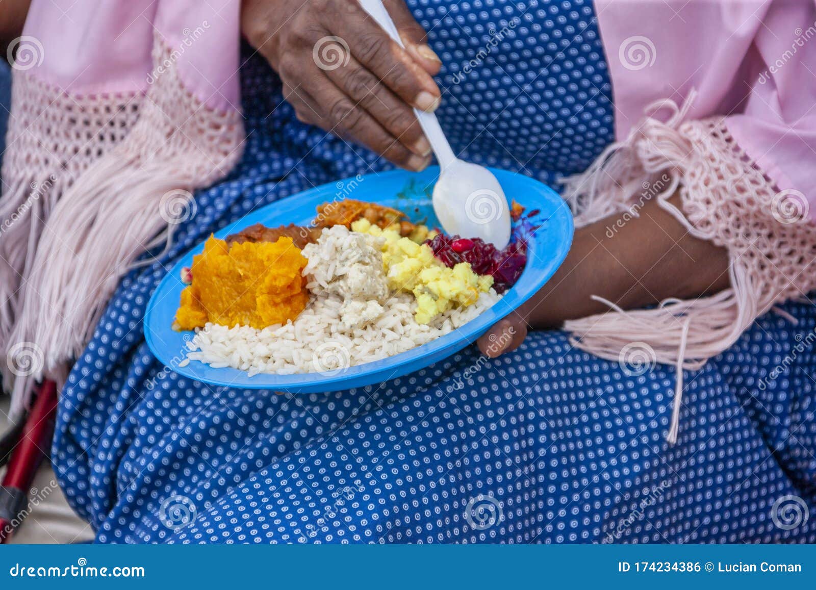african woman having lunch