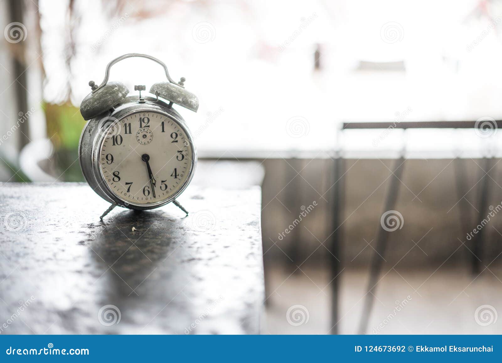 Old Alarm Clock on the Ancient Iron Table. Stock Photo Image of retro