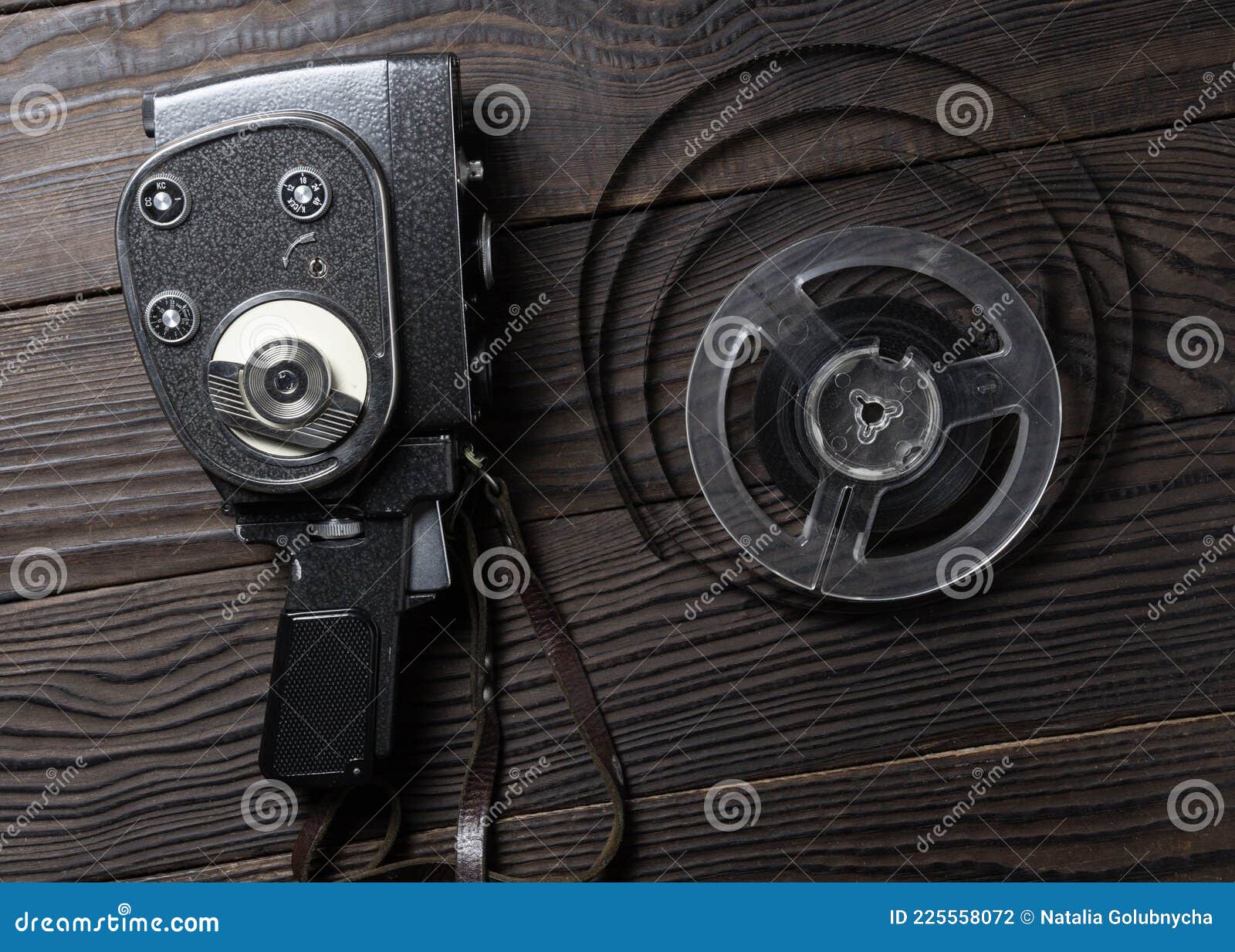 Old Amateur Movie Camera and Reel of Film Stock Stock Photo