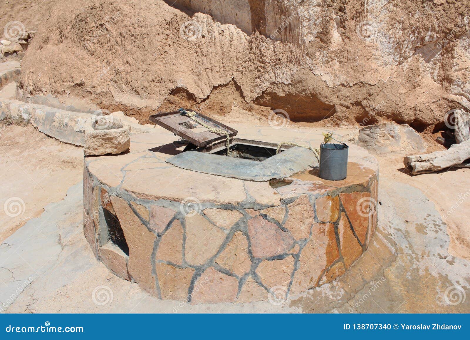 A Well in the Middle of the Desert Stock Photo Image of background