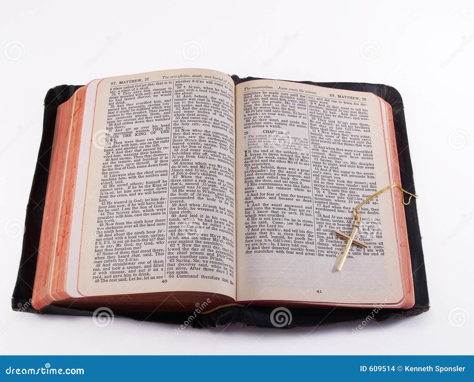 old bible with gold cross