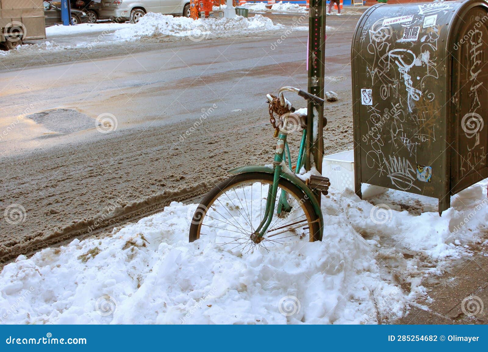 Old Bike Stuck in the Snow. Stock Photo Image of pole, street 285254682