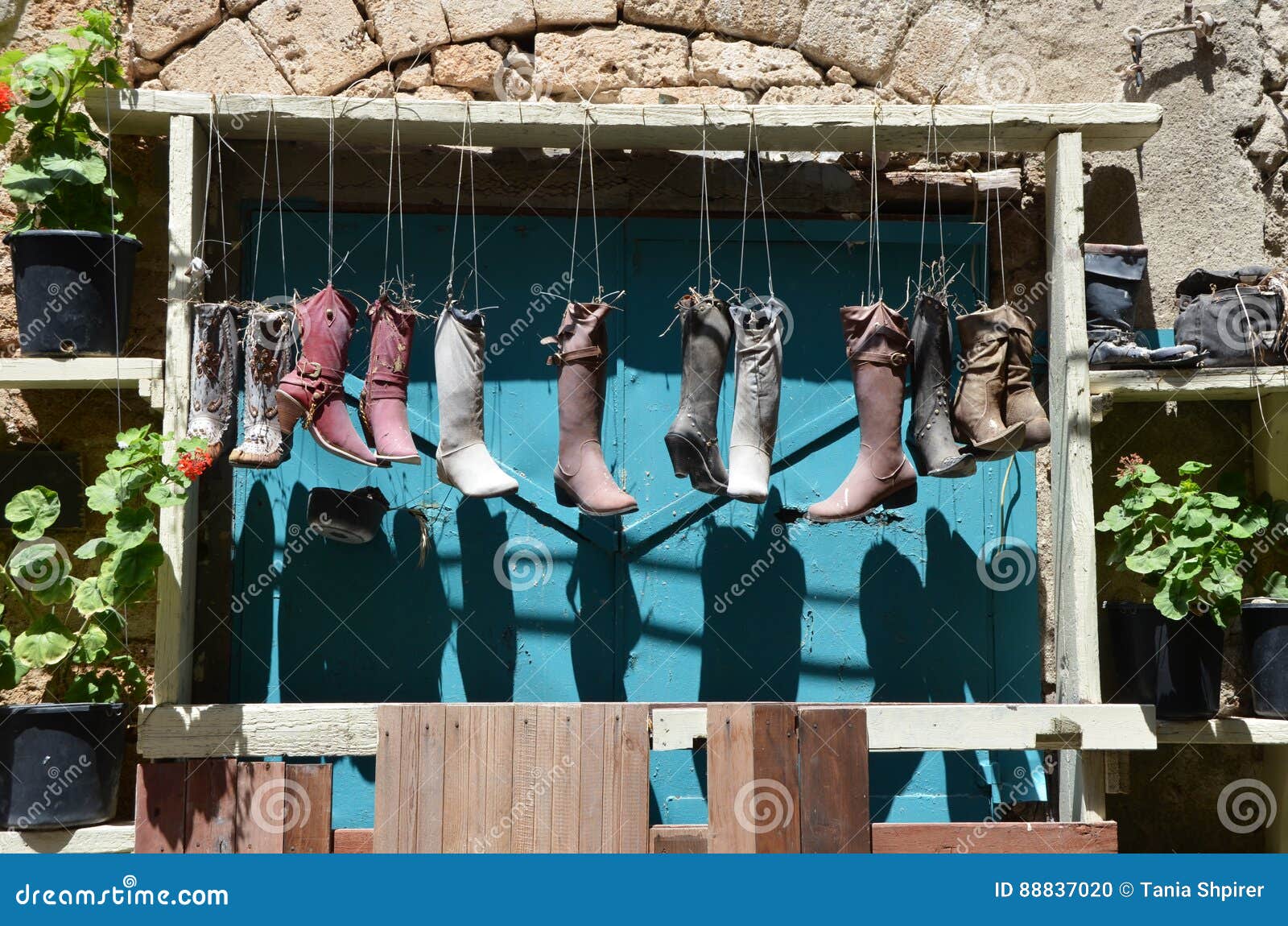 Old boots on a frame stock photo. Image of beach, palnts - 88837020