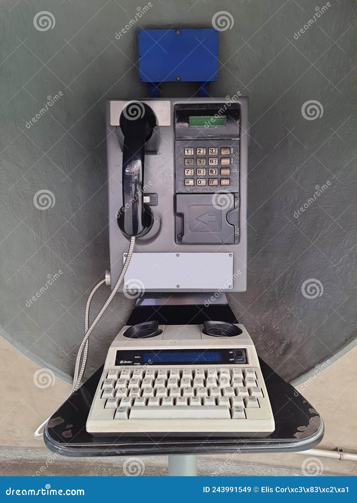 Old Boxed Telephone. Public Telephone for the Hearing Impaired. Stock