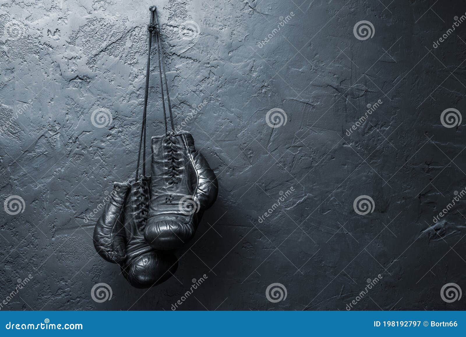 old boxing gloves hang