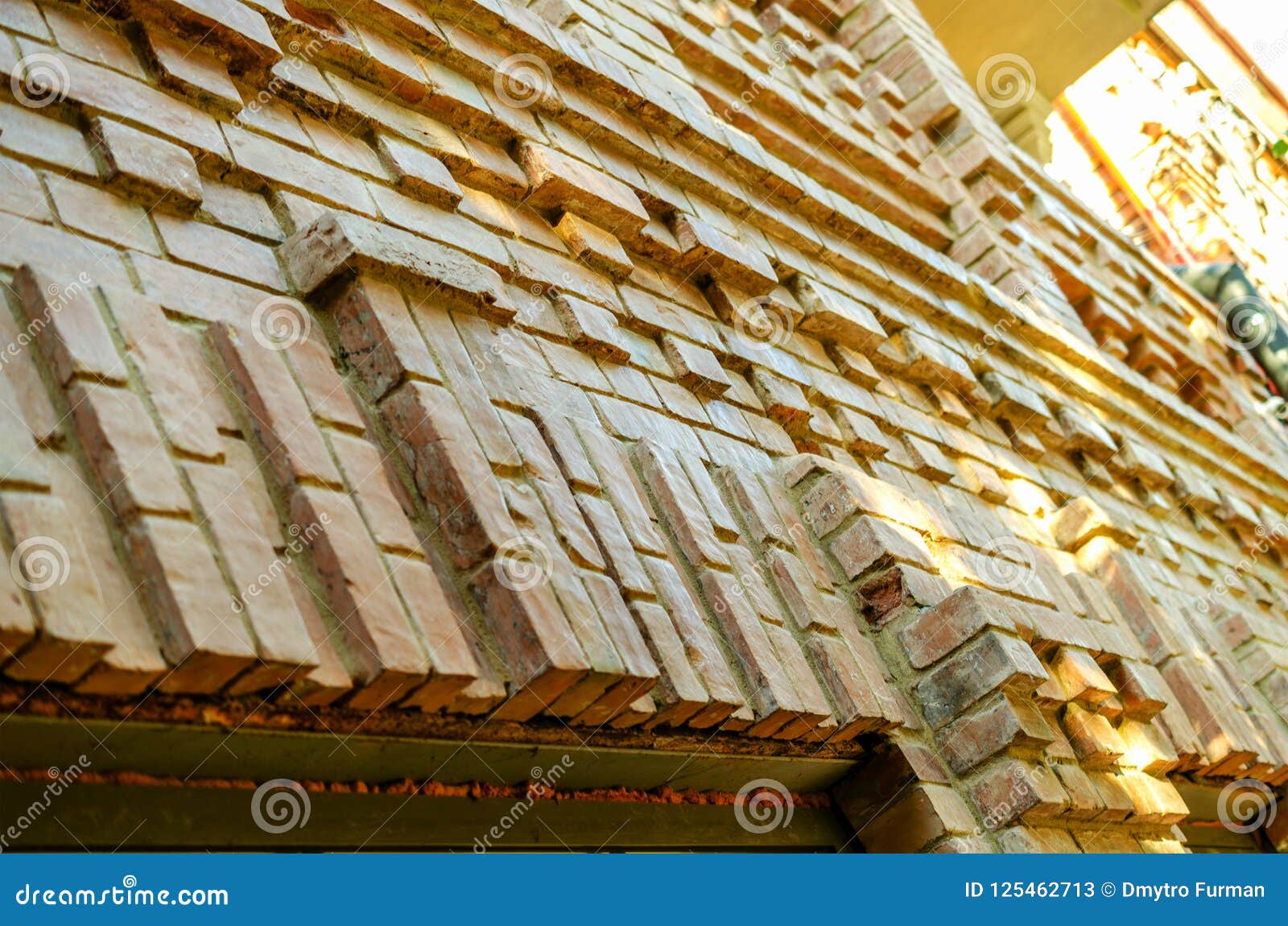 old brick ancient wall background. decorative abstract background. rough red old brickwork. used for conceptual and visual 