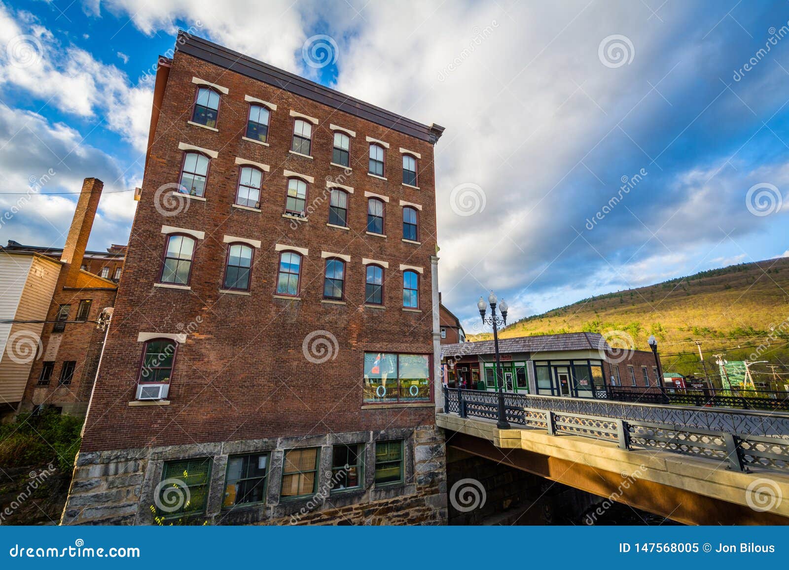 Old Brick Building and Bridge in Brattleboro, Vermont Editorial Image