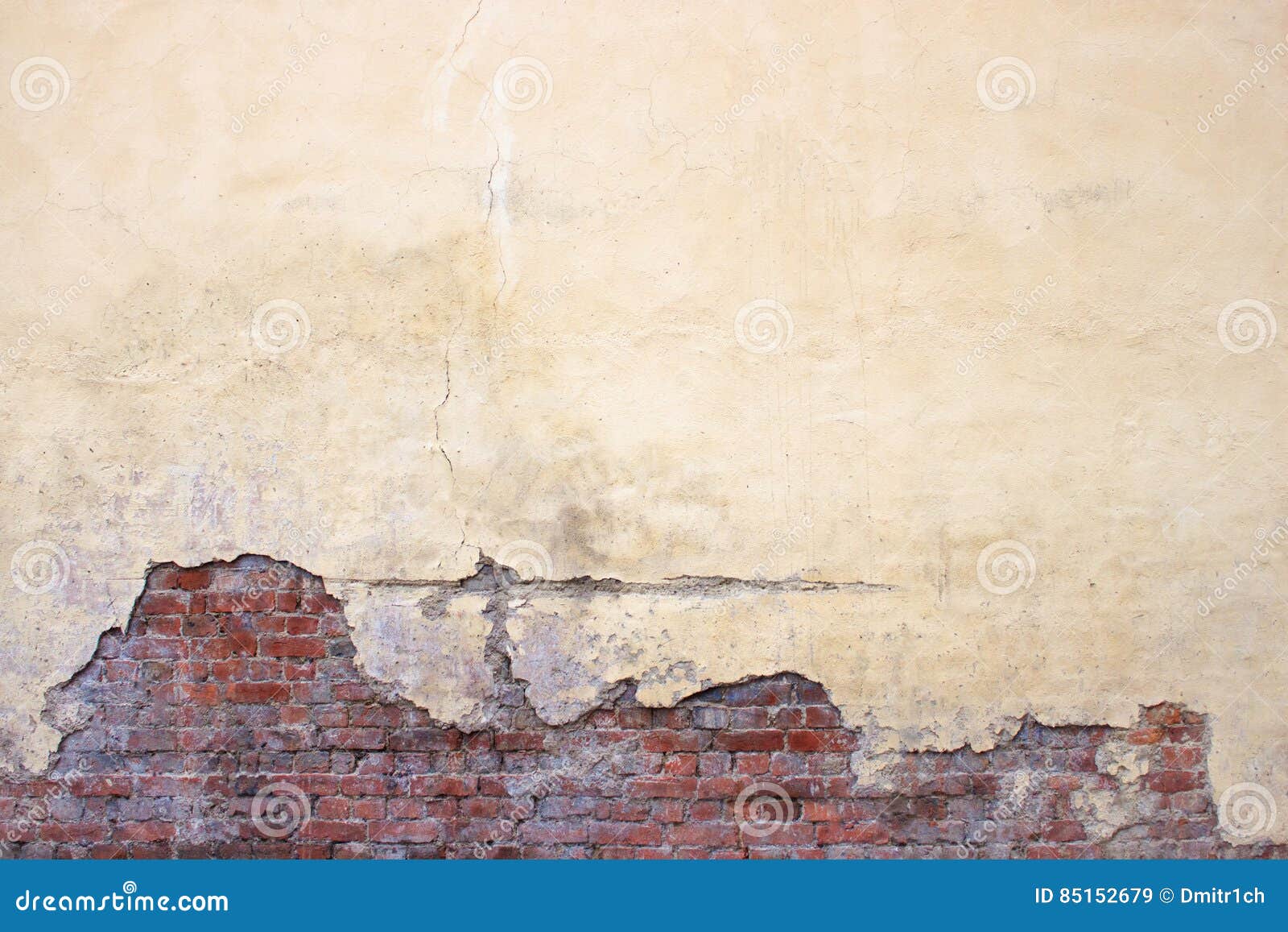 old brick wall with peeling plaster, grunge background