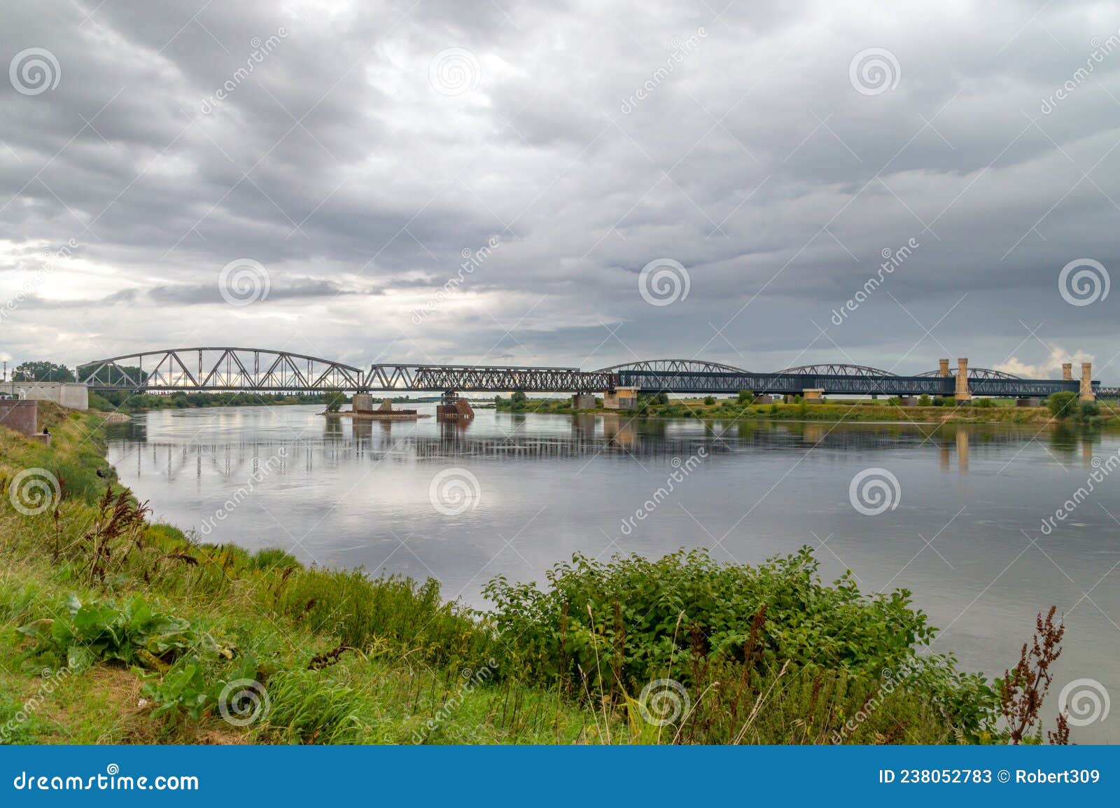 old bridges over vistula river at cloudy day in tczew, poland