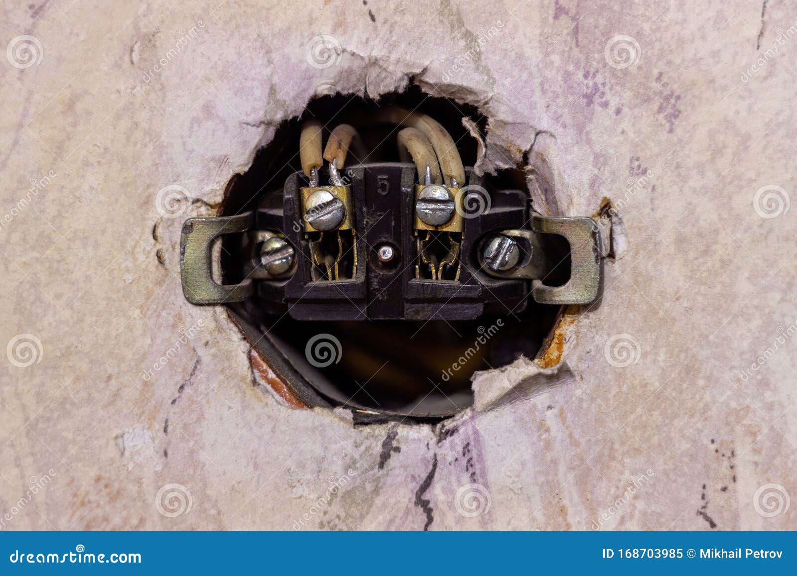 Old Broken Electrical Socket Fell Out of Wall. a Violation Electrical