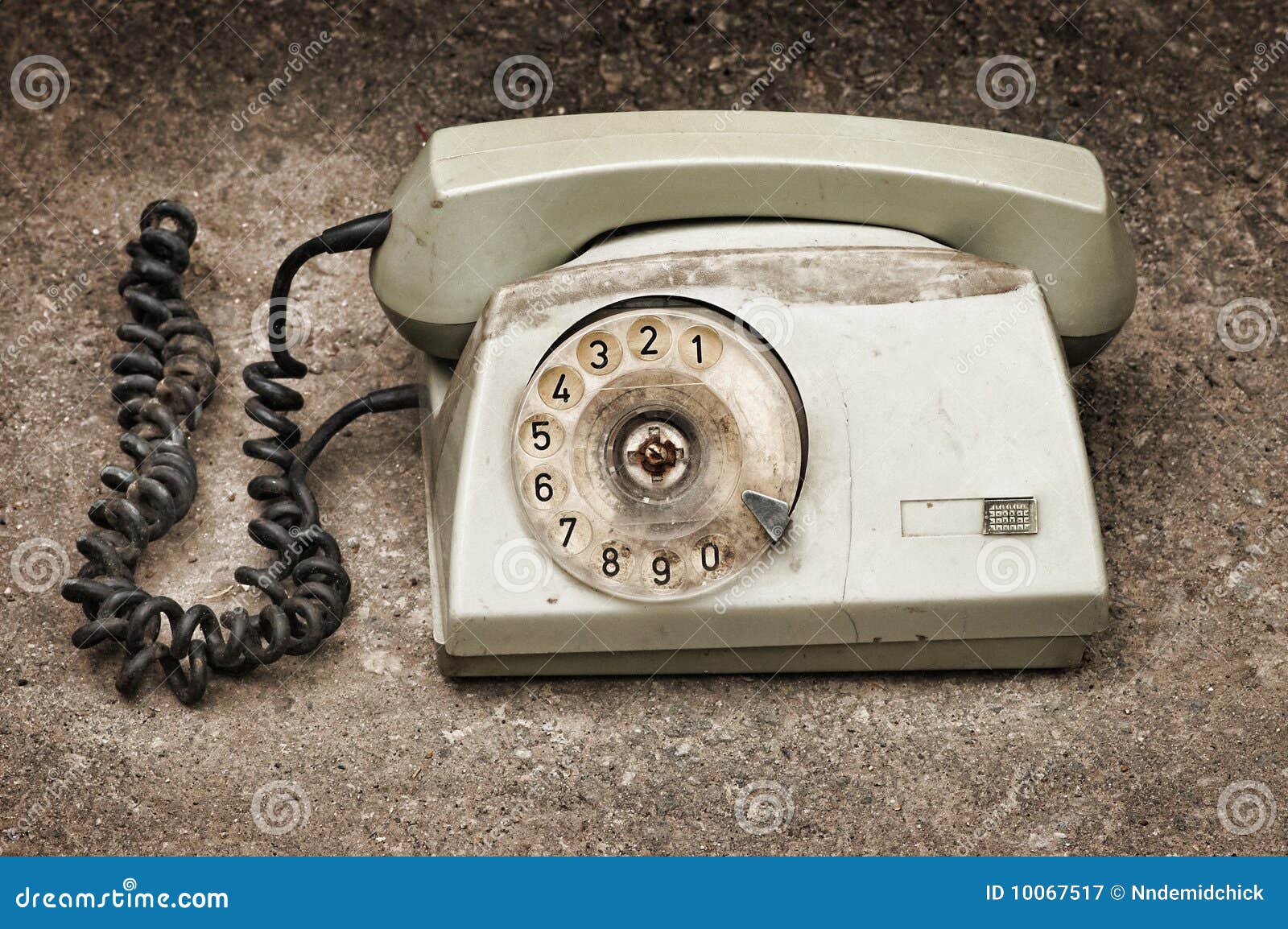 Old Broken Phone On Asphalt Background Royalty Free Stock Photography