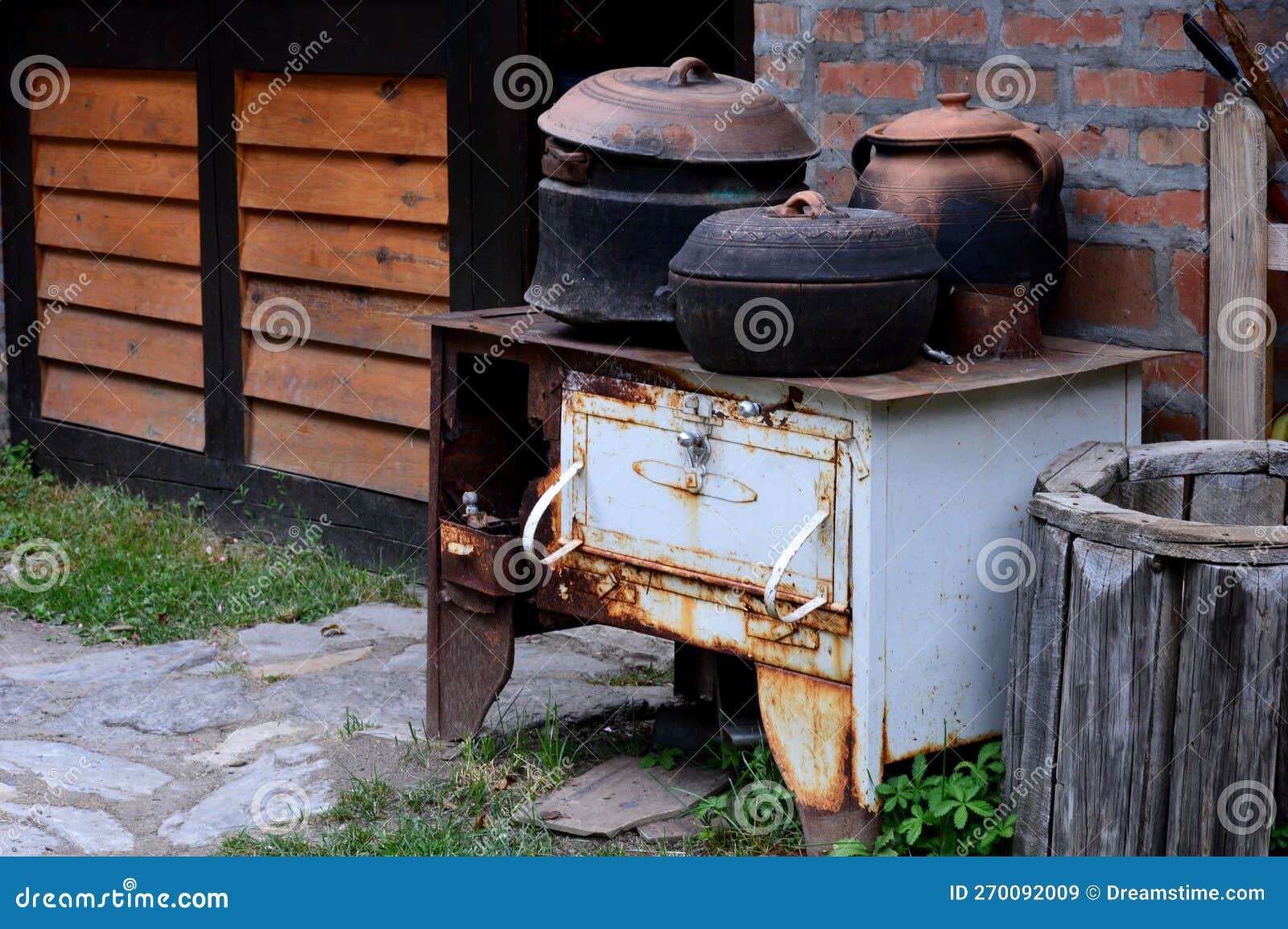 Old Broken Stove and Old Dishes Stock Image Image of iron, food