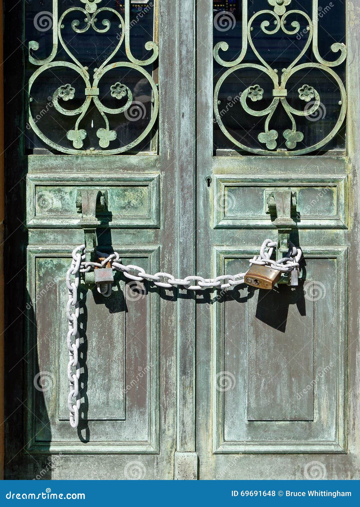 Old Bronze Doors Secured with Lock and Chain Stock Photo Image of door, chain 69691648