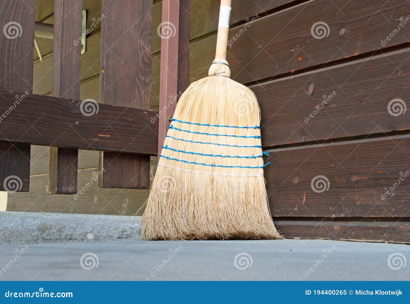 Old broom at a door stock image. Image of housework 194400265