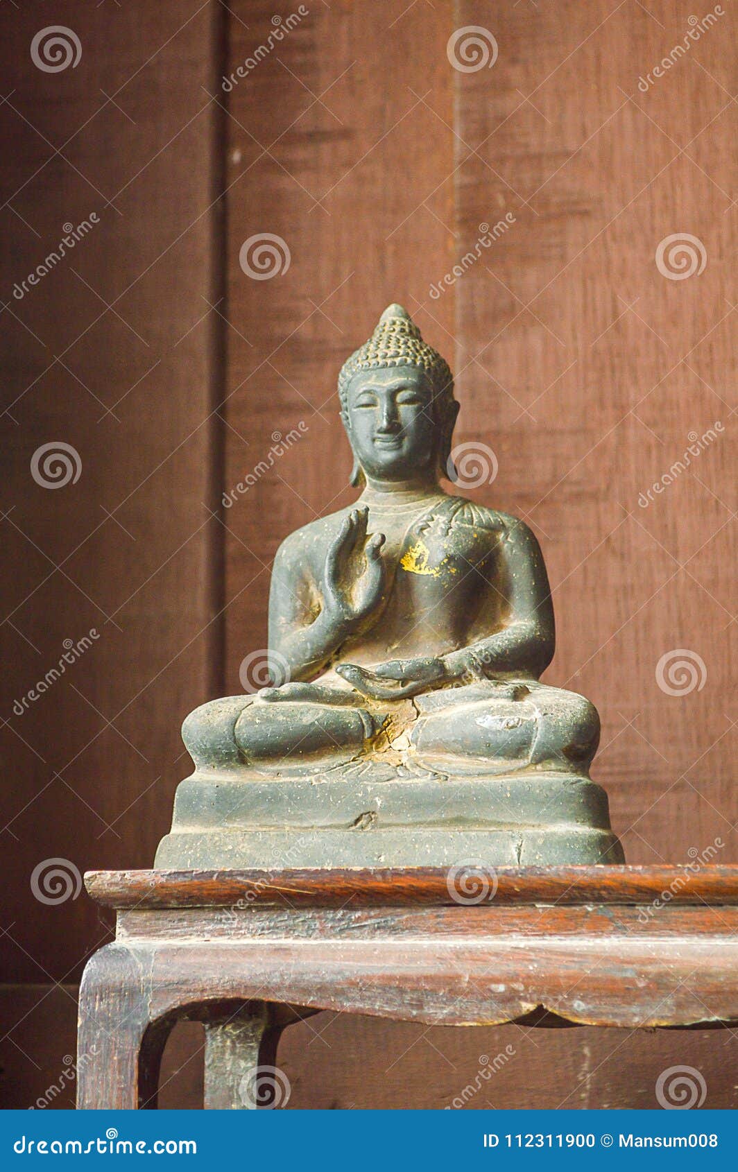 Old buddha statue on table stock photo. Image of buddhism 112311900