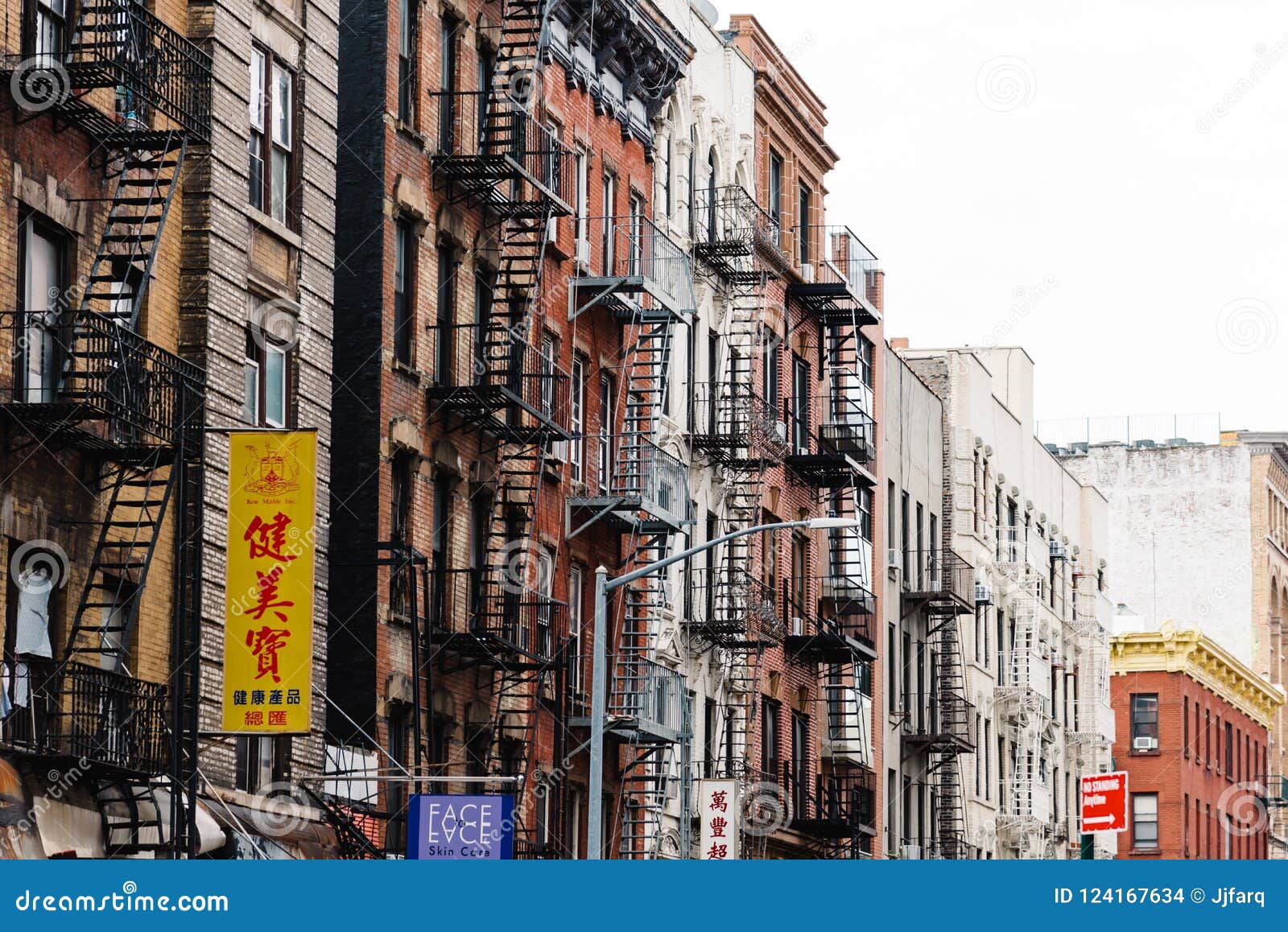Old Buildings with Fire Escapes in Chinatown in New York Editorial ...