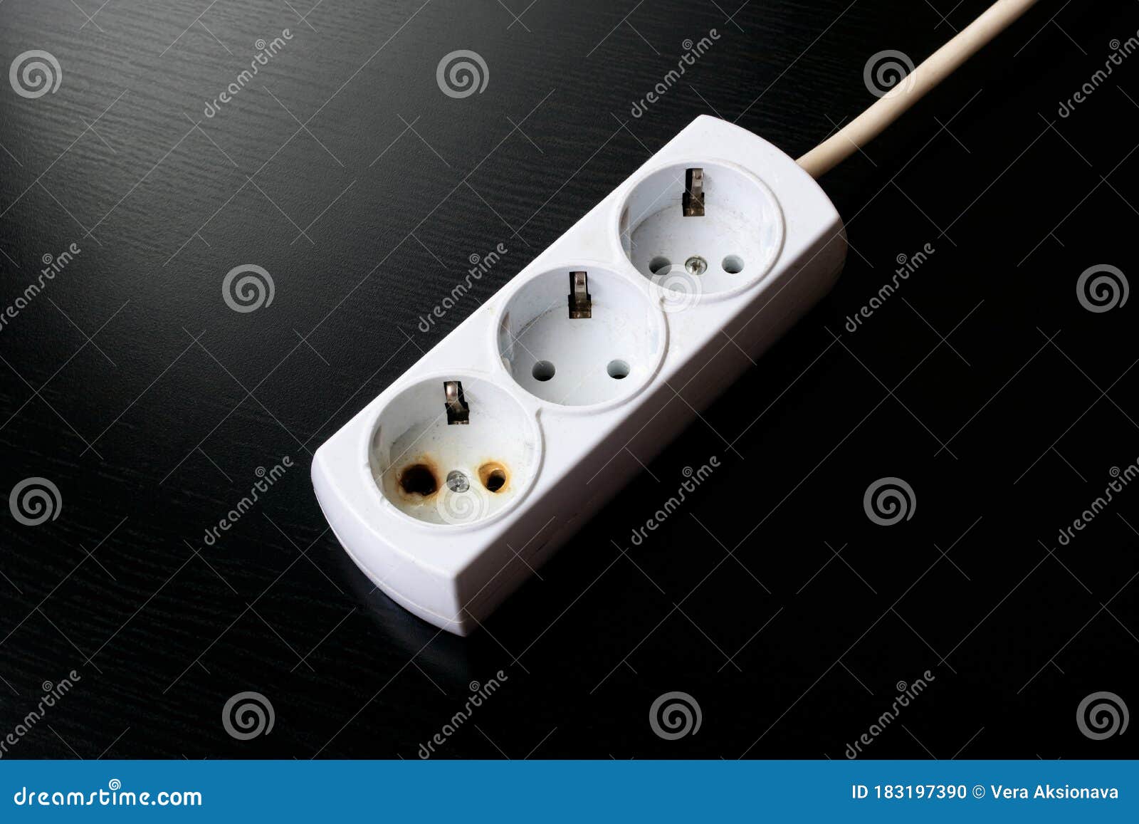 Old Burnt Extension Cord on a Black Background Stock Photo Image of
