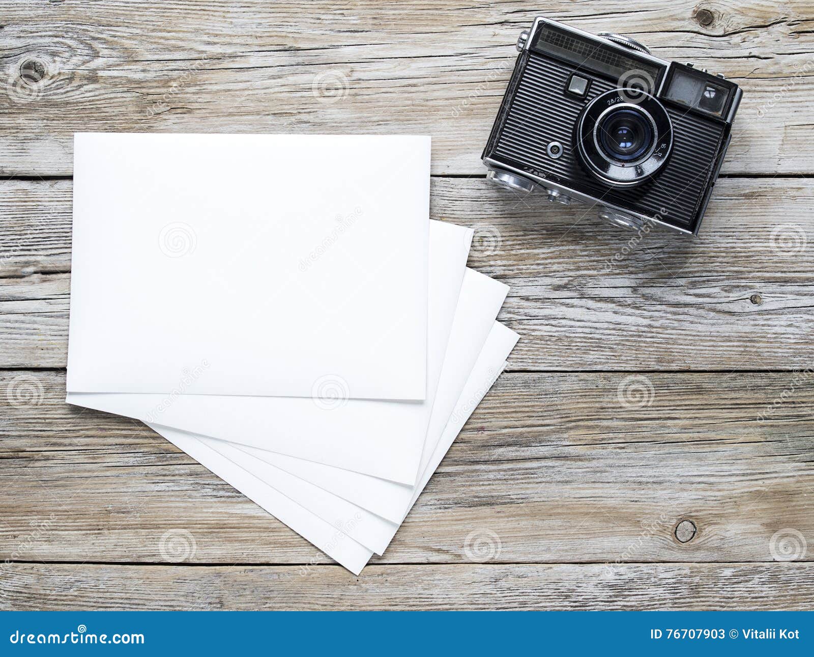 Old camera and photo paper stock image. Image of film 76707903