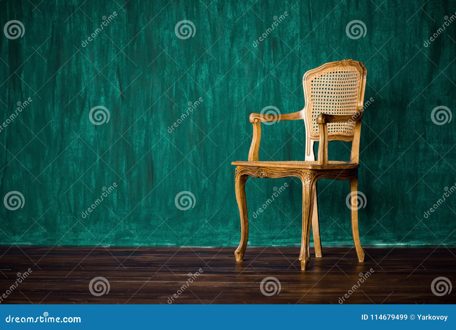 Old Chair on a Green Wall Background. Stock Image Image of background