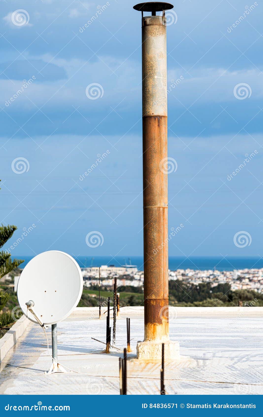 Old chimney and satellite stock image. Image of crete 84836571