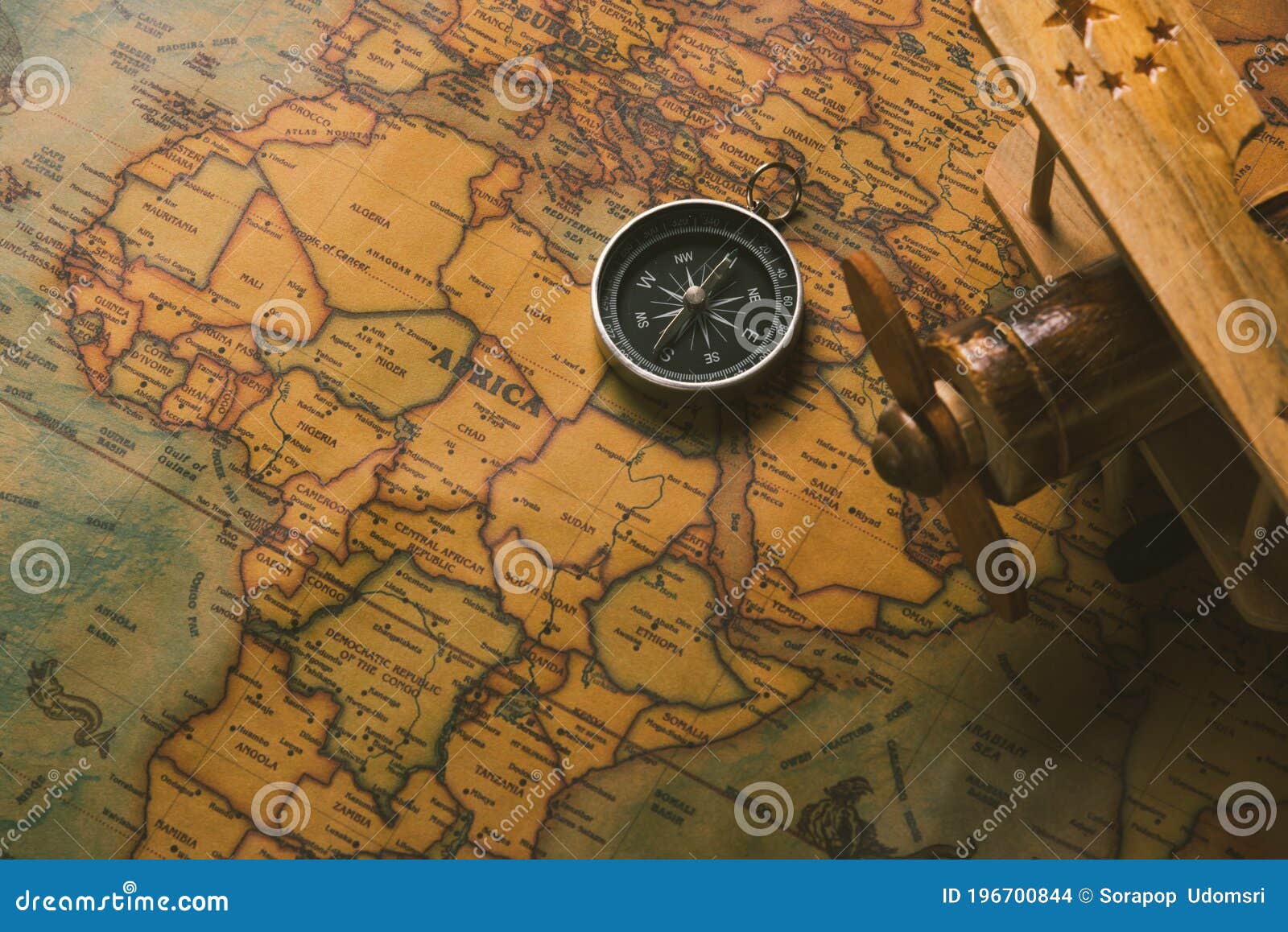 Old Compass Discovery and Wooden Plane on Vintage Paper Antique World Map  Stock Photo - Image of compass, history: 196700844