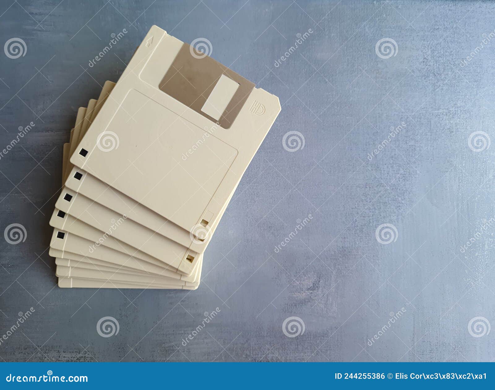 old computer diskette, unlabeled, , on a gray surface.