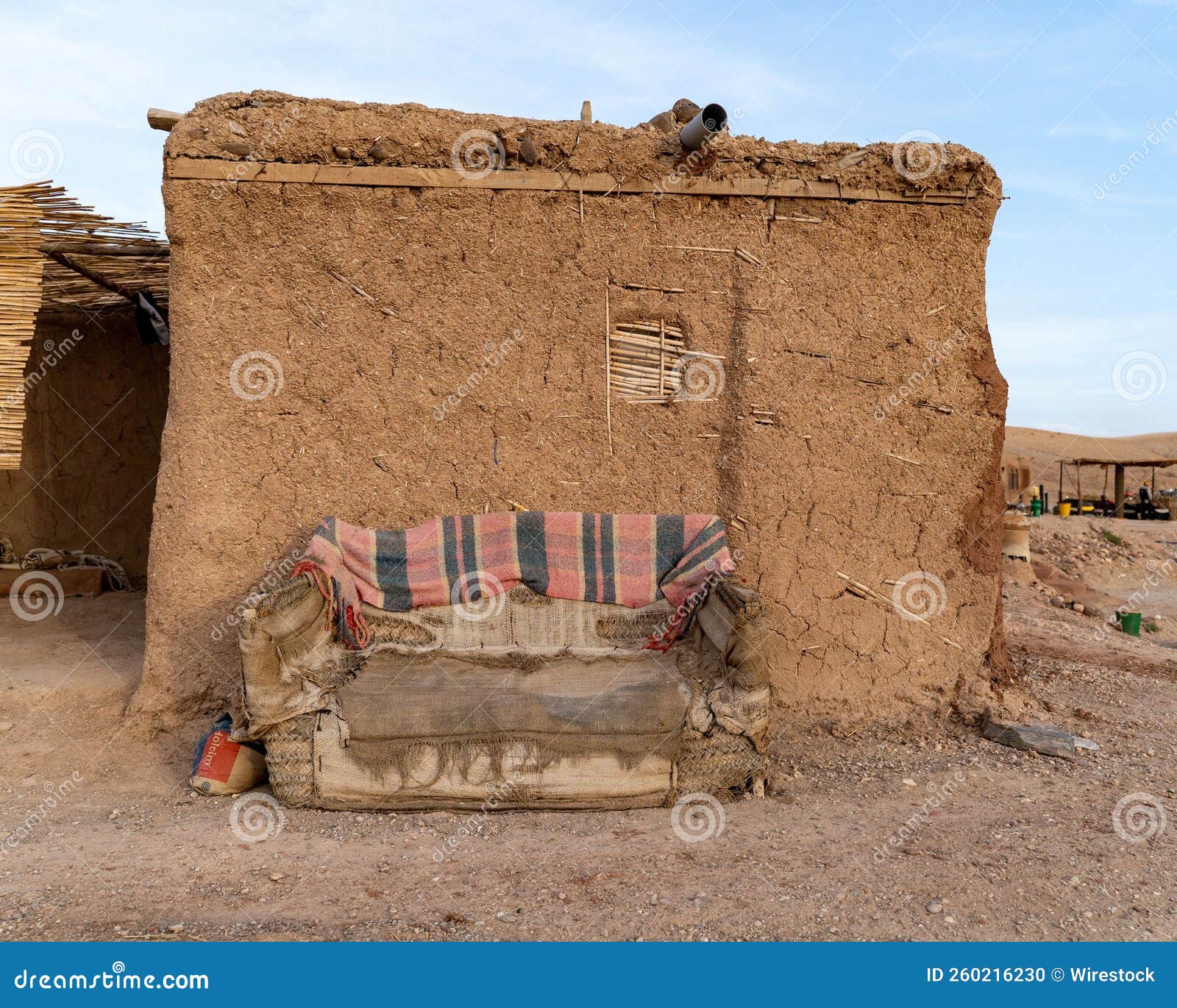 Old Couch in Front of a Building Inside the Desert in Marrakech