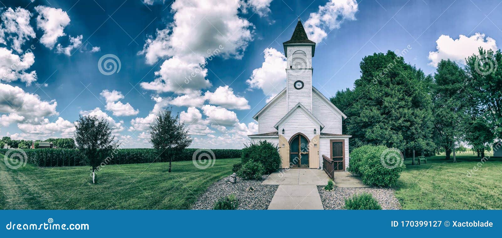 Ancient Church Of Blue Color In Village Stock Photo - Download