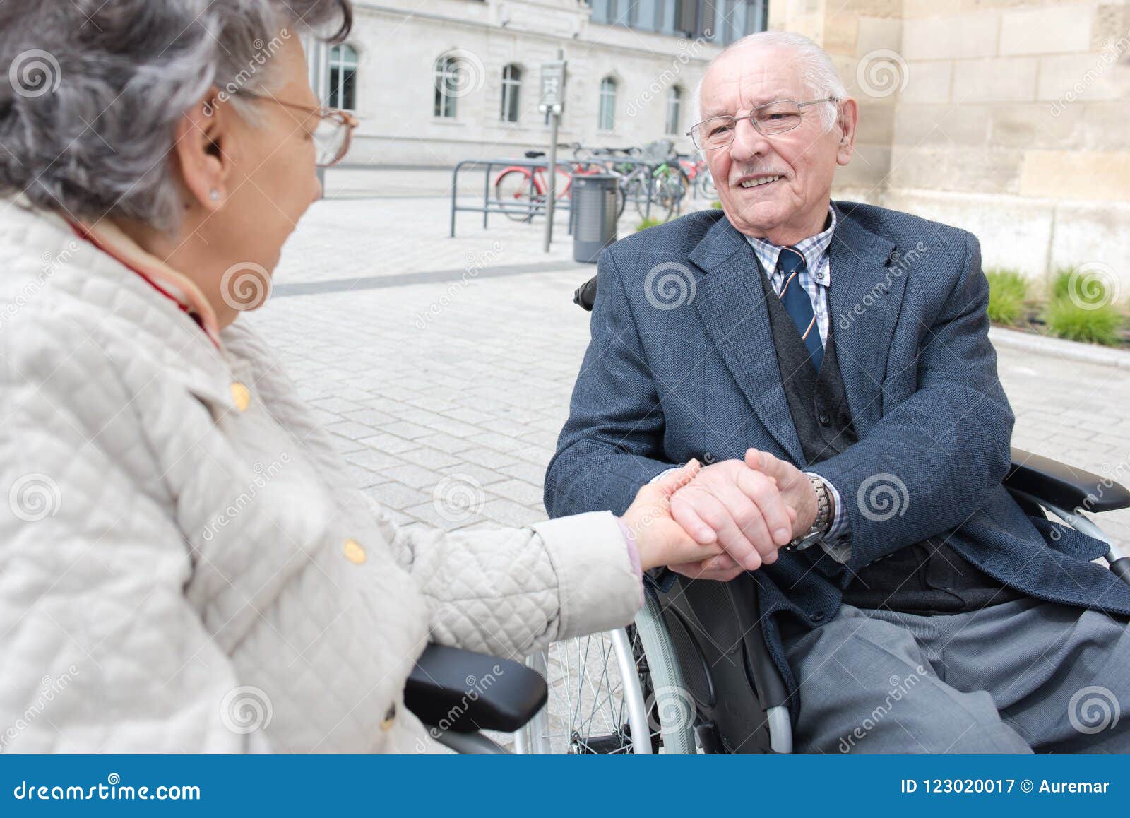 Old Couple in Wheelchair Holding Hands Outdoors Stock Image Image of