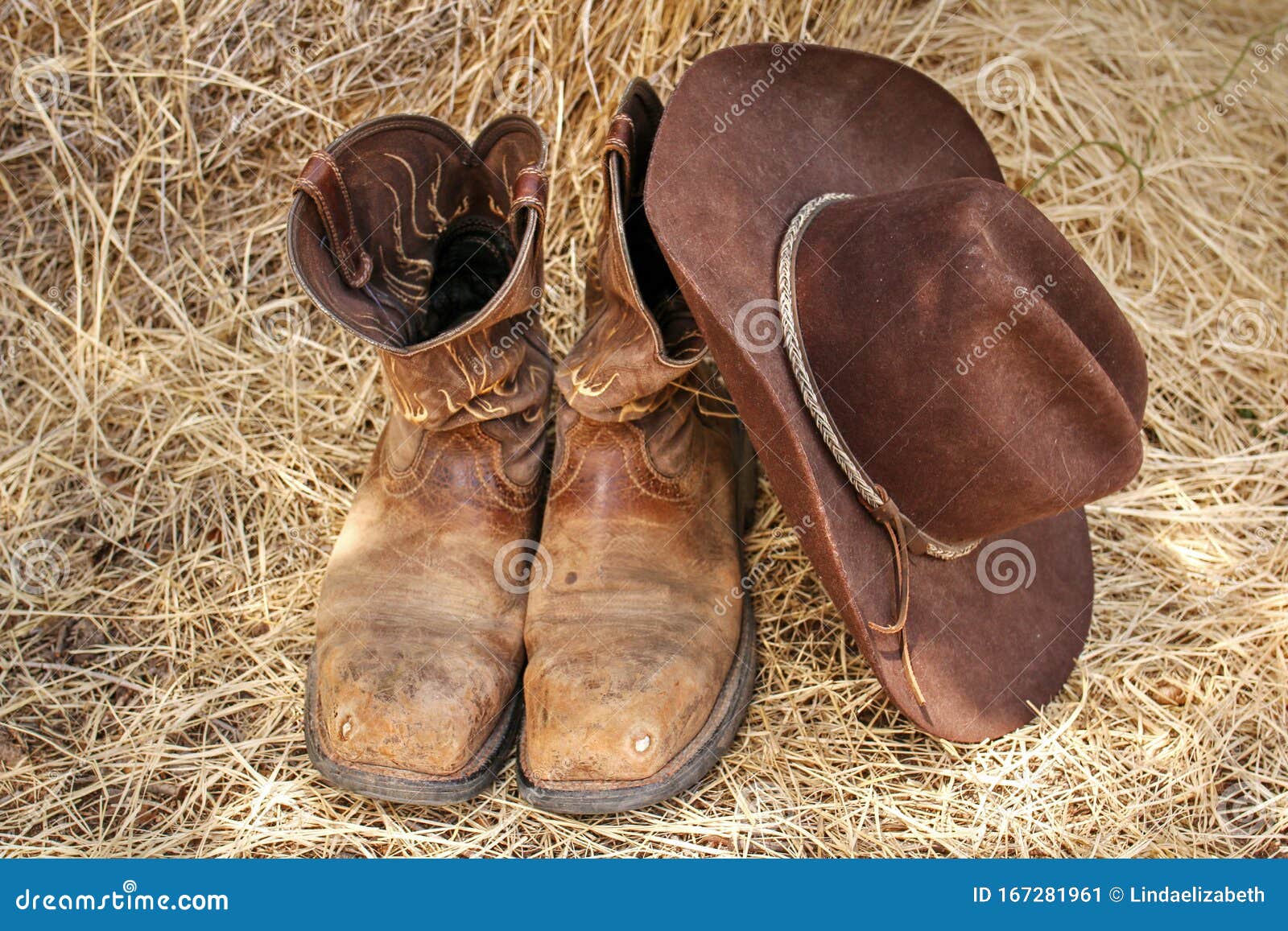 Old Cowboy Boots And Hat On Background Of Hay Stock Image - Image of ...
