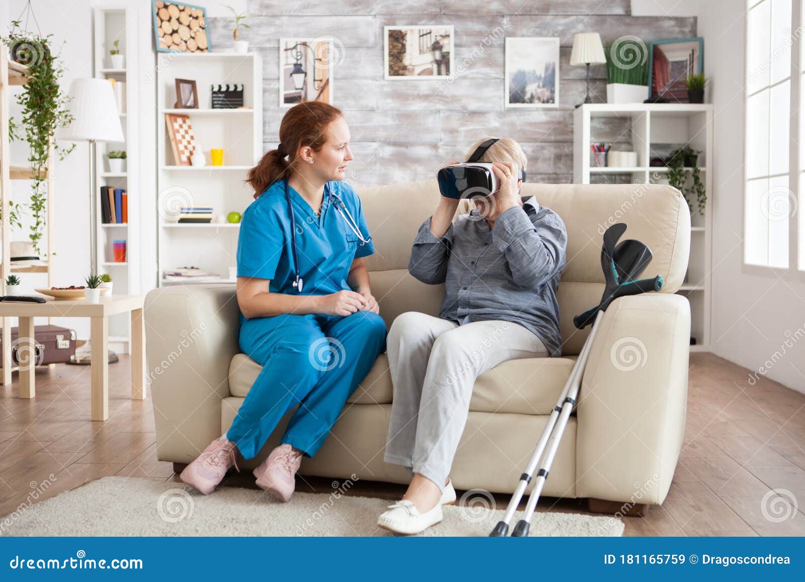 Old with with Crutches in Nursing Home Using Virtual Reality Glasses