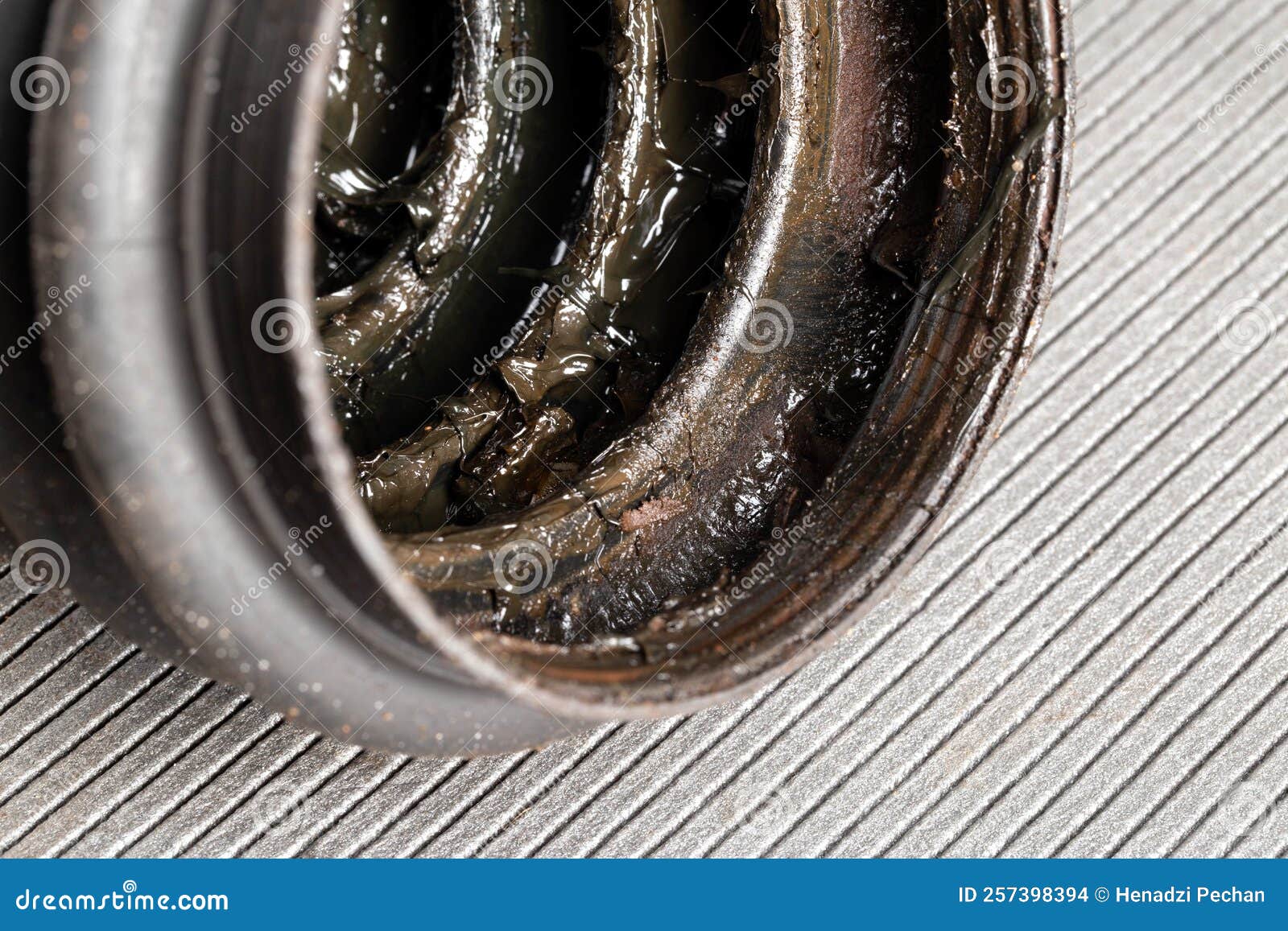 old cv joint boot providing protection and dirt ingress into the constant velocity joint, macro