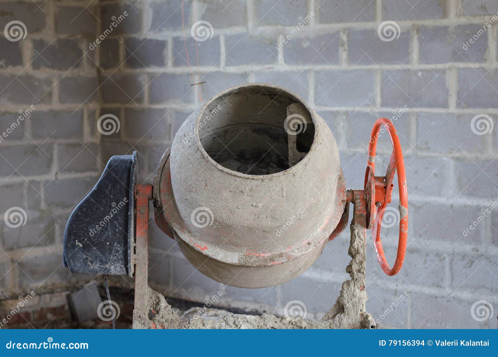 Old Dirty Cement Mixer at a Construction Site. Stock Photo Image of