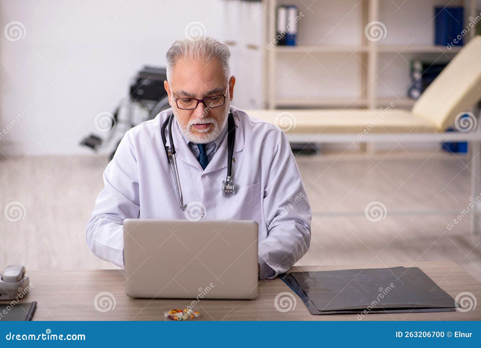 Old Male Doctor in Telemedicine Concept Stock Photo - Image of medicine ...